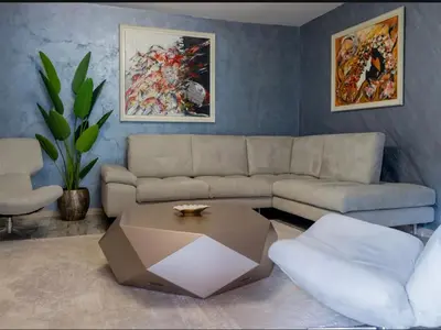 a living room with a couch and a coffee table at Villa Sun Castle in Kotor