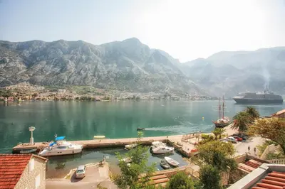 a view of a body of water with boats in it at Apartments Bella Vista in Kotor