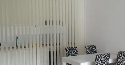 a white room with chairs and a white table at BH Rialto in Sveti Stefan