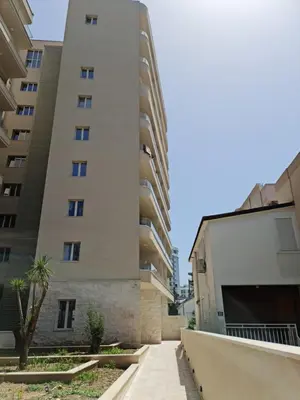 an external view of an apartment building at AS Apartments Budva in Budva