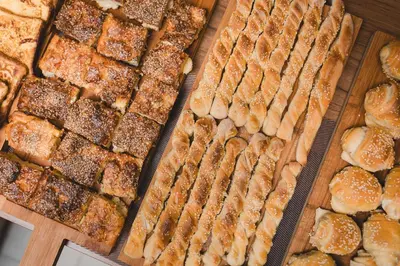 a bunch of different types of breads and pastries at Gufo Apart in Budva