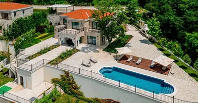 an aerial view of a house with a swimming pool at Oak Leaf Residences in Budva