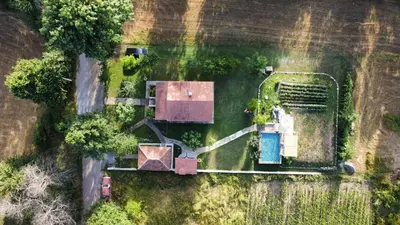 an aerial view of a yard with a pool at Forest Home in Golubovci