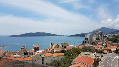 a view of a city with the water and buildings at Lux Apartment Vidovic II in Rafailovici