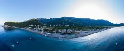an aerial view of an island in the water at Apartments Galija in Petrovac na Moru