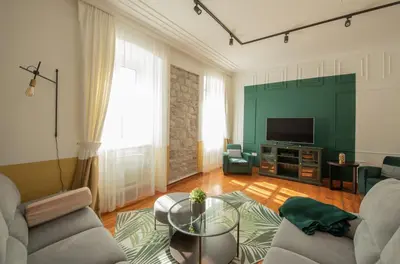 a living room with a couch and a tv at Kotor Nest in Kotor