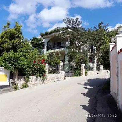 a house on the side of a road at Vila Maljevik in Sutomore