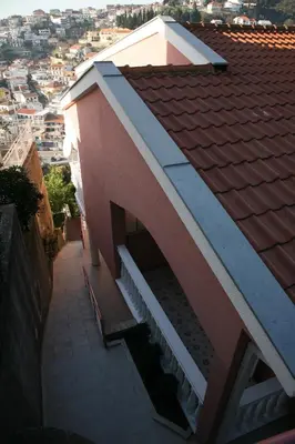 a roof of a building with a stair case on it at Omega Apartments in Ulcinj