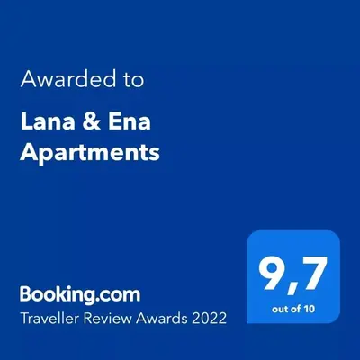 a blue text box with the words awarded to llana and era appointments at Lana & Ena Apartments in Kotor