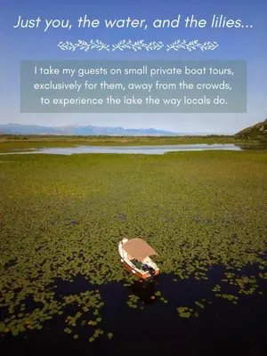 a person in a boat in the water at Prevalis Nature Cottage in Virpazar