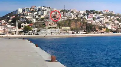 a red circle is sitting on top of a beach at Cosy Apartment in Ulcinj with Sea View - 40 m² in Ulcinj