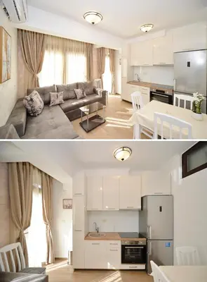 a living room and kitchen of a apartment at Langust - free parking in Sveti Stefan