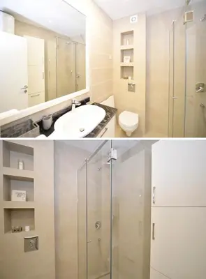 a bathroom with a sink and a toilet and a mirror at Langust - free parking in Sveti Stefan