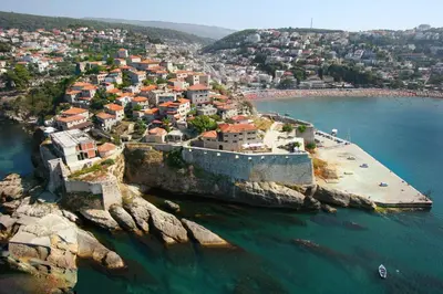 an aerial view of a town on the water at Modern Studio with Sea View - Ulcinj - 25 m² - Balcony in Ulcinj