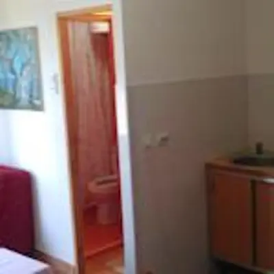 a bathroom with a toilet and a sink in a room at Modern Studio with Sea View - Ulcinj - 25 m² - Balcony in Ulcinj