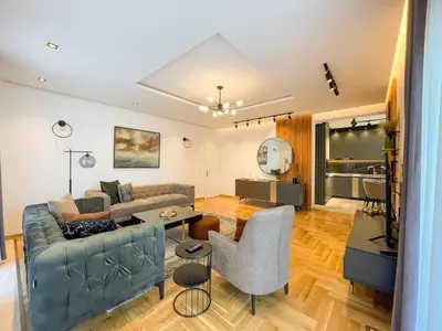 a living room with a couch and a table at B&B Lovac in Ulcinj