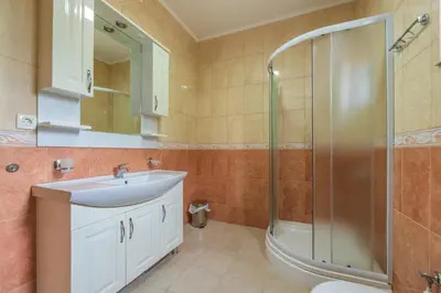 a bathroom with a sink and a shower at Villa Sunny Hill in Budva