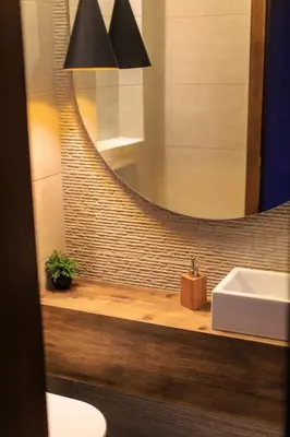 a bathroom with a sink and a mirror at Regina del Mare in Bar