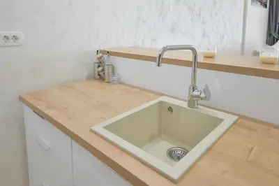 a kitchen counter with a sink in a kitchen at Apartment Old Town Budva in Budva