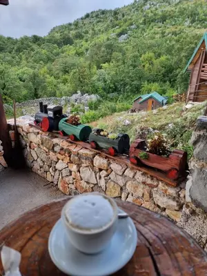 a table with a toy train on a train track at Livari Viewpoint in Livari