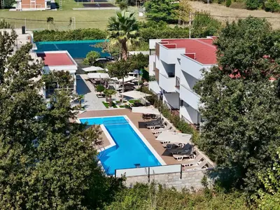an aerial view of a resort with a swimming pool at Hotel Halibas in Ulcinj