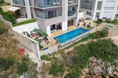 an aerial view of a house with a swimming pool at First line of the sea 1 in Dobra Voda
