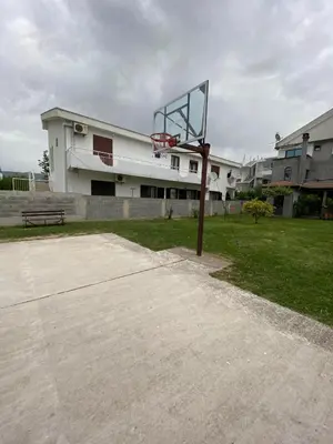 a basketball hoop in front of a building at Apartments Toni in Ulcinj