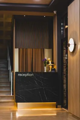 a store front door with a registration sign on it at Hotel 219 Budva in Budva