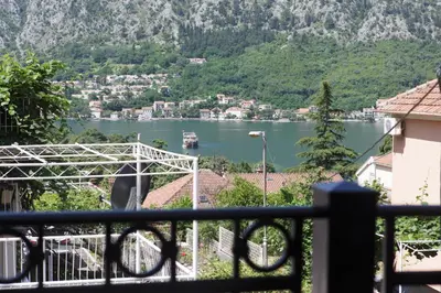 a view of a lake from a balcony at ENA Apartment in Kotor