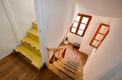 an overhead view of a staircase in a house at Portobello Old Town in Kotor