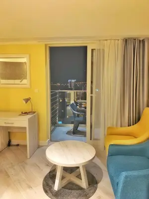 a living room with a couch and a table at Hotel Pierina in Budva