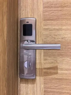a close up of a cell phone unlocking a door at Basileus Apartments Budva in Budva
