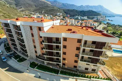 an aerial view of a building in a city at Apartment Anatolia Pekovic in Becici