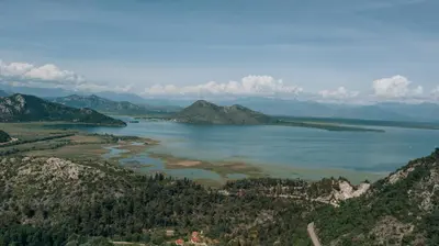 an aerial view of a lake in the mountains at Apartment Majstorina in Virpazar