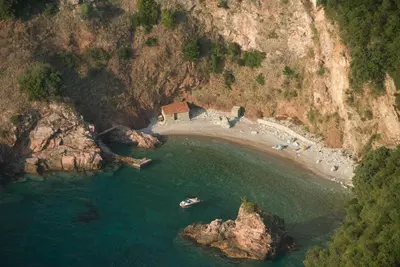 an aerial view of a small island in the water at Brand New Apartments - free parking in Sveti Stefan