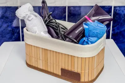 a wooden container filled with office items on a table at Antonella in Kotor