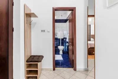 a bathroom with a toilet in a room at Antonella in Kotor