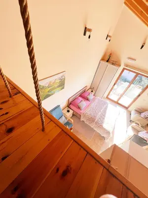 a view of a living room from the top floor at Apartments Aerodrom in Podgorica