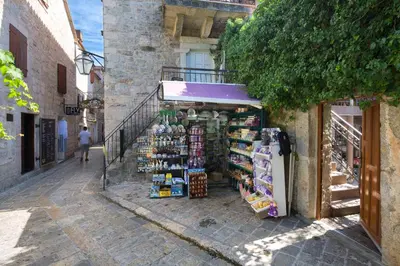 a store in an alley with a store sidx sidx at Apartment Kovacevic Old Town in Budva