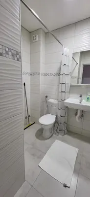 a bathroom with a toilet and a sink at Apartmani Vila Milaris in Ulcinj