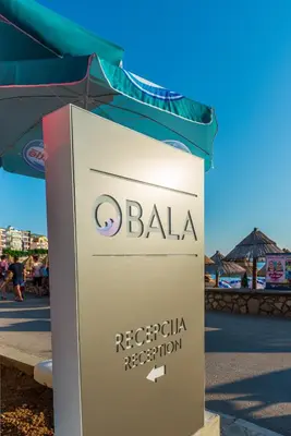 a sign for a bahia reggae resort at Hotel Obala in Dobra Voda
