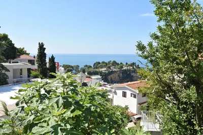 a view of the ocean from a house at Apartments Aleksandar in Ulcinj