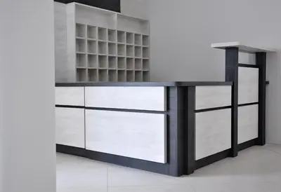 a desk with glass fronts in a room at Apartments Harmony in Utjeha