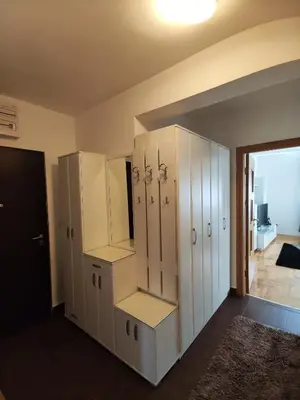 a room with white lockers in a room at Apartment For a Day in Podgorica