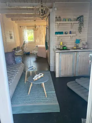 a living room with a couch and a table at Stella Marina in Pržno
