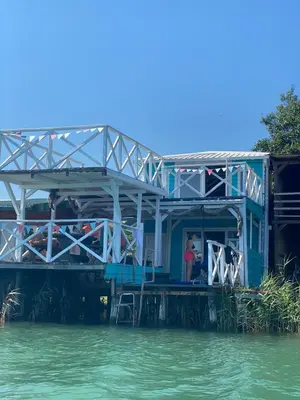 a house on a dock on the water at Stella Marina in Pržno