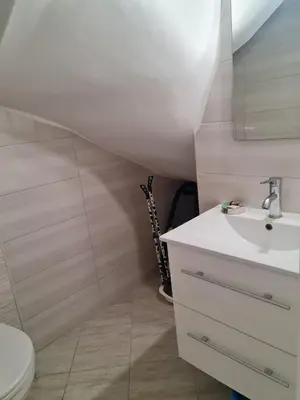 a bathroom with a sink and a toilet at Vi apartment 1lin of the sea in Bar