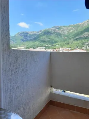 a balcony with a view of a mountain at 
