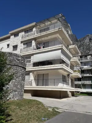 a large building with balconies on the side of it at Minka 2 in Kotor