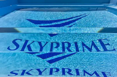 a sign in a swimming pool that says swimirm pyramid at Villa Skyprime in Budva